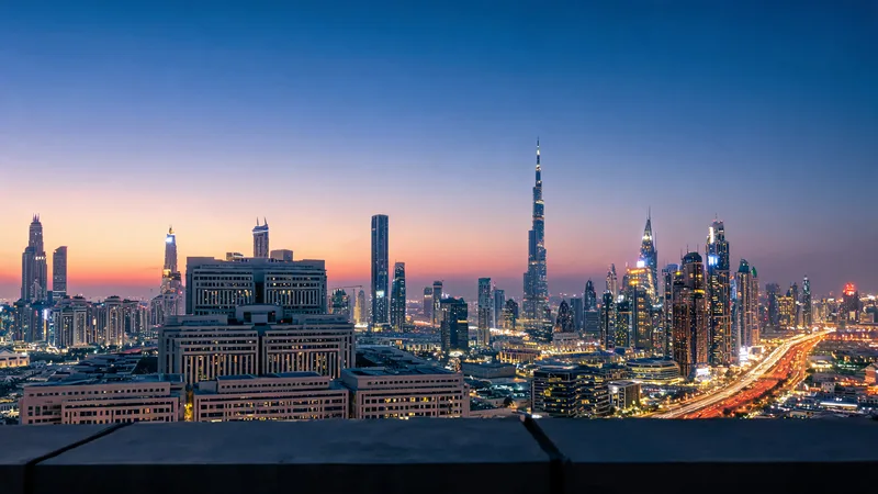 Dubai skyline at dusk showing the contrast between formal government district and commercial towers, the dual legal and marketplace reality in the UAE