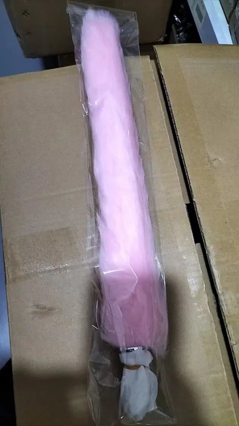 Pink tail anal plug packaging showing the product with its faux fur tail