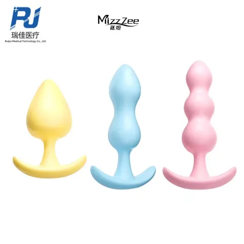Set of three silicone anal plugs in teardrop gourd and beaded shapes in yellow blue and pink