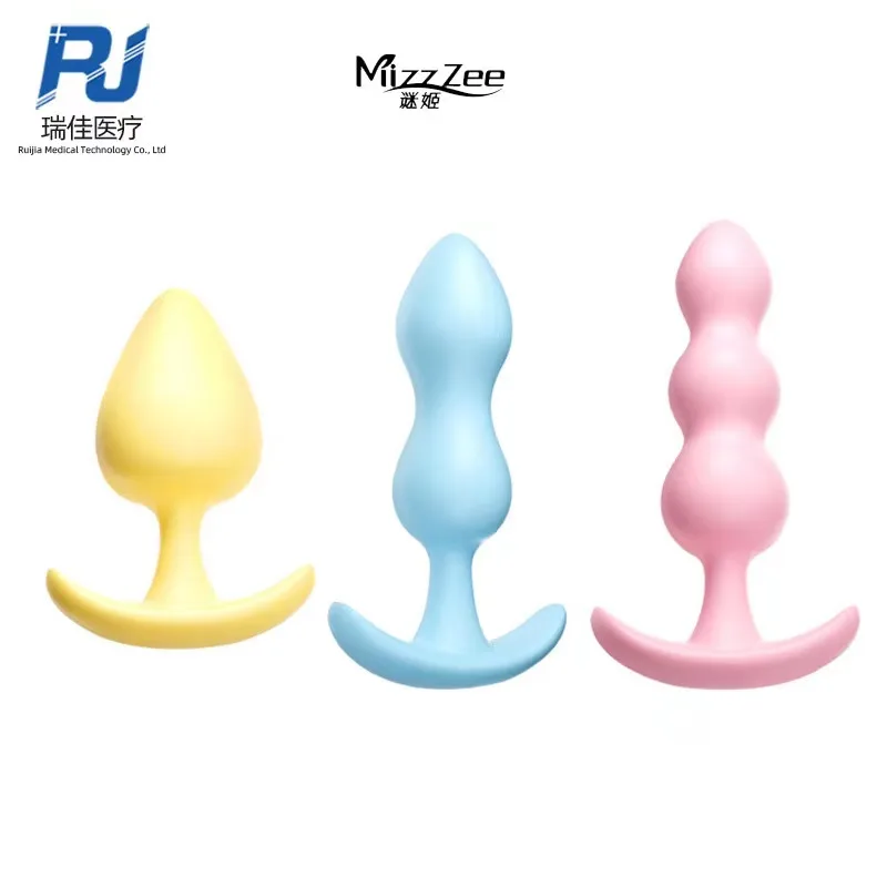 Set of three silicone anal plugs in teardrop gourd and beaded shapes in yellow blue and pink