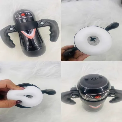 Handheld masturbator resting at an angle to show rear and side entry positions