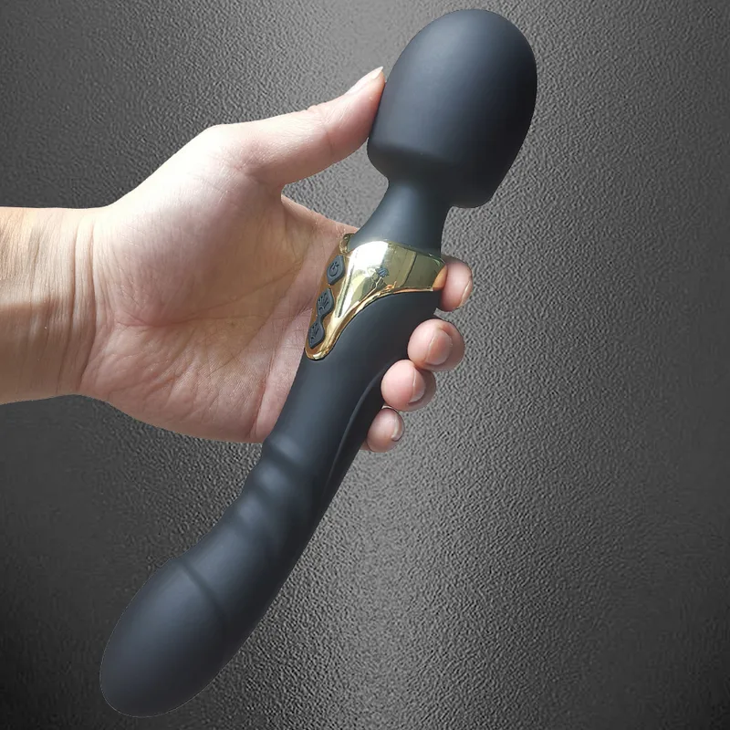 Vibrator 025 held in a hand for size reference
