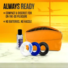 Three delay rings beside a travel pouch and lubricant bottle for on-the-go use