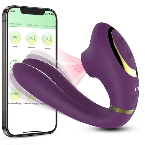Purple dual-action vibrator with flexible shaft and clit suction head
