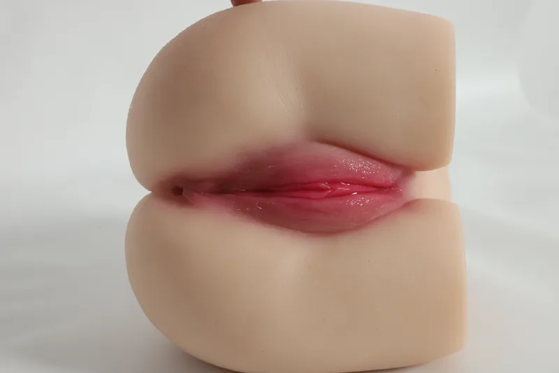 Soft pink entrance of a butt doll