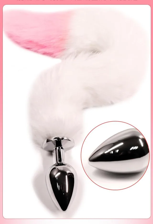 Pink and white fox tail anal plug with a polished metal plug and a curled faux fur tail