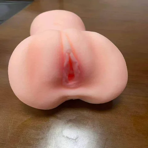 Close-up showing the baby-soft skin and labia sculpting of the torso