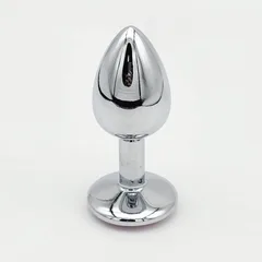 Jeweled metal anal plug in teardrop shape with a blue crystal set into its flared base