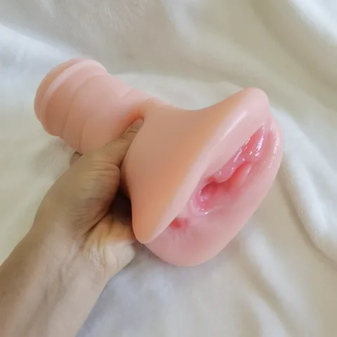Pocket pussy held in hand