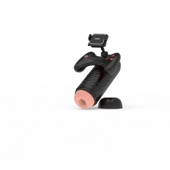 Black masturbation cup beside its dome-shaped base and protective cover