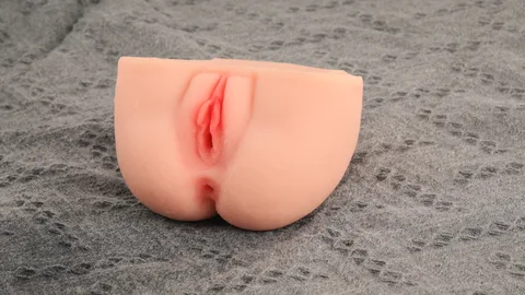 Dual vaginal and anal openings on the lifelike torso doll
