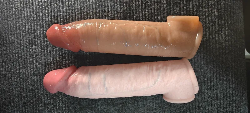 Flesh-tone realistic penis extender sleeve with sculpted shaft detail