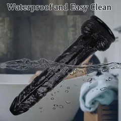 Black dildo shaft with raised veining texture close up