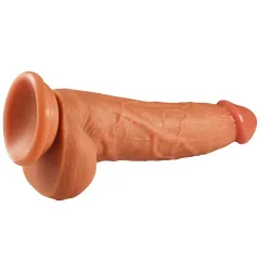 Lifelike glans head and shaft detail on the flesh-tone silicone dildo