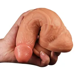Flexible silicone shaft bent to show the bendable body of the dildo