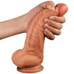 Angled view of the realistic dildo showing shaft texture and base