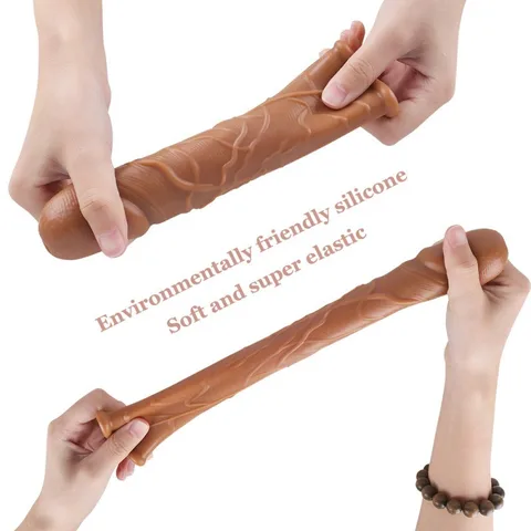 Hand stretching the super-elastic silicone sleeve to show its flexibility