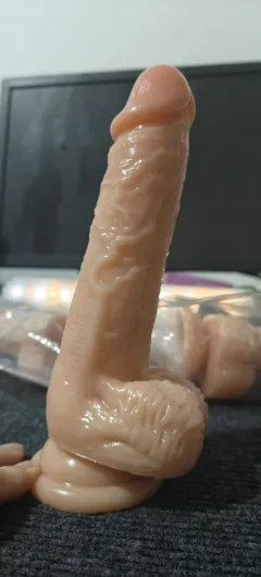 defined glans and testicles on a suction cup base
