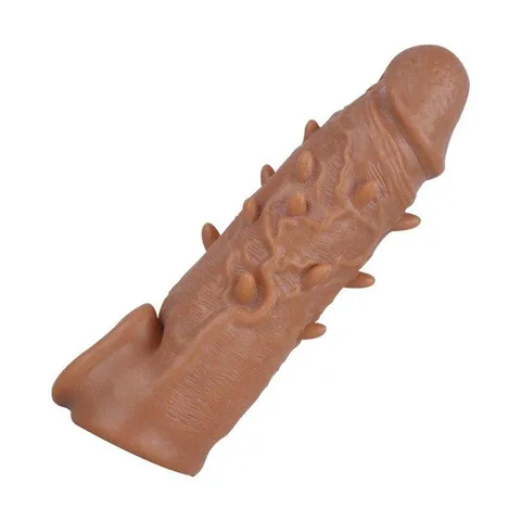 Ball-ring base of the spiked penis extender sleeve held in view