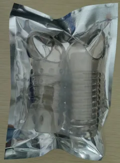 Two-piece penis sleeve set in plain retail packaging