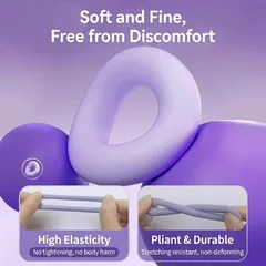 Soft silicone delay ring stretched between two hands to show high elasticity and a pliant non-deforming surface