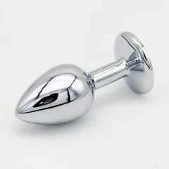Close-up of the silver teardrop anal plug showing its polished metal finish