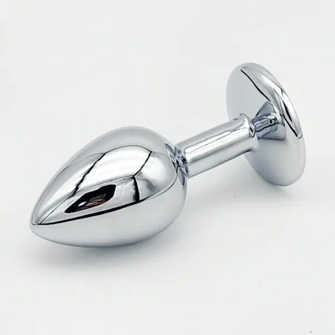 Close-up of the silver teardrop anal plug showing its polished metal finish
