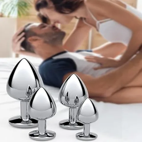 Small steel anal plug shown to reveal weight and comfortable grip