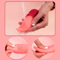 Washing the flexible silicone tongue under a running tap