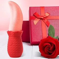 Rose tongue vibrator beside a ribboned gift box and a red rose
