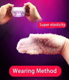 Spiked penis sleeve stretched over a hand to show the flexible super elastic fit