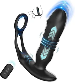 Thrusting anal vibrator with dual cock rings shown with its illuminated thrusting and vibrating zones