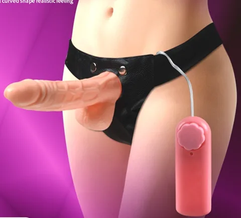 Wearable strap-on dildo with realistic shaft mounted on an adjustable snap-button belt harness