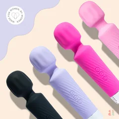 Wand vibrator shown next to its USB charging cable for scale and portability