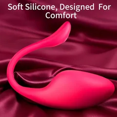 Soft silicone body of the egg vibrator resting on satin for comfortable wear